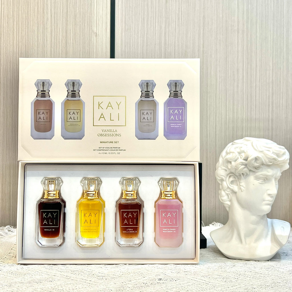 KAYALI Set Cadou Parfum 4x10ml – Oud, Vanilla & Floral | 2 Seturi Disponibile