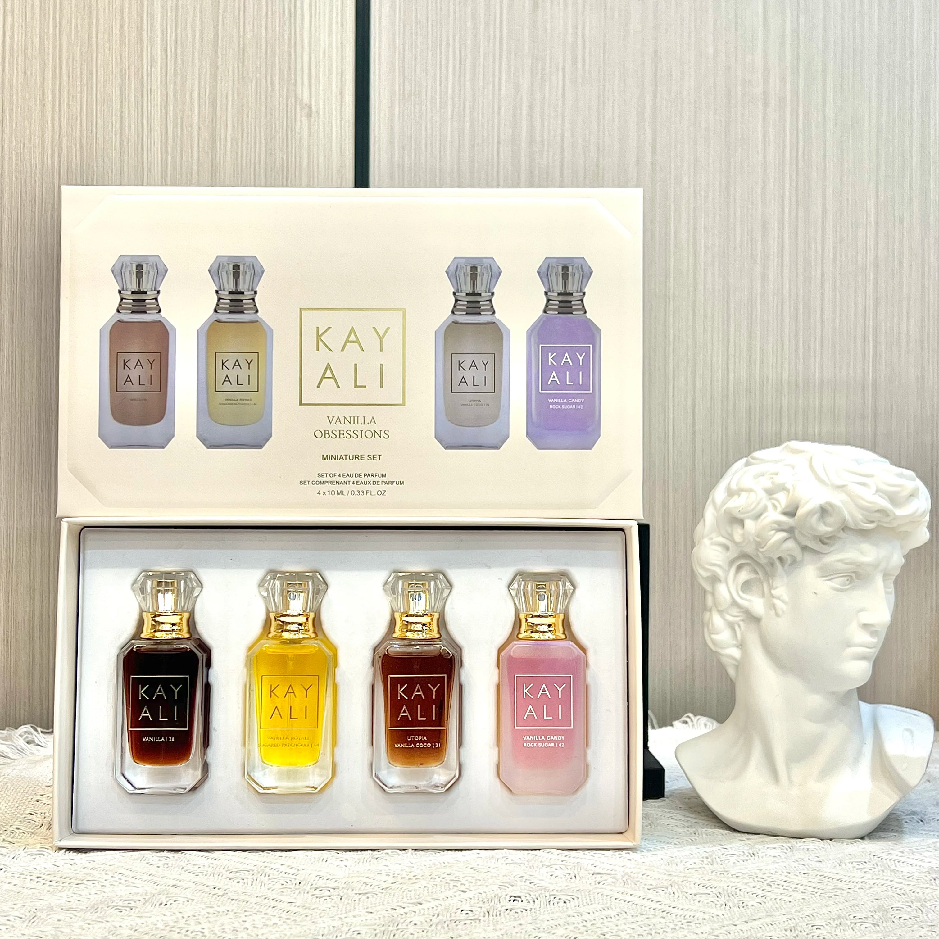 KAYALI Set Cadou Parfum 4x10ml – Oud, Vanilla & Floral | 2 Seturi Disponibile
